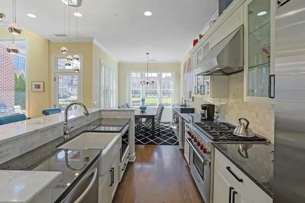 Dining room, Interior, Kitchen, Pendant Lights, Recessed Lighting, Stainless Steel Appliances, Wood Texture Flooring