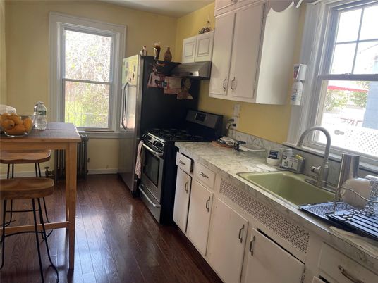 Interior, Kitchen, Tile Countertops, Wood Texture Flooring