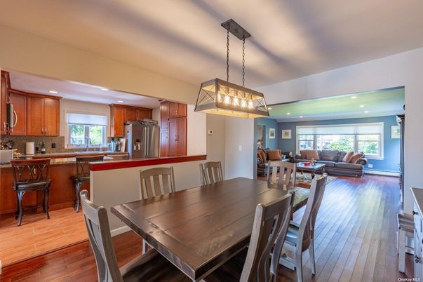 Dining room, Interior, Kitchen, Living room, Pendant Lights, Recessed Lighting, Stainless Steel Appliances, Wood Texture Flooring