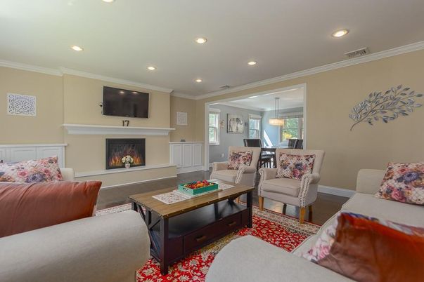 Dining room, Fireplace, Interior, Living room, Pendant Lights, Recessed Lighting, Wood Texture Flooring