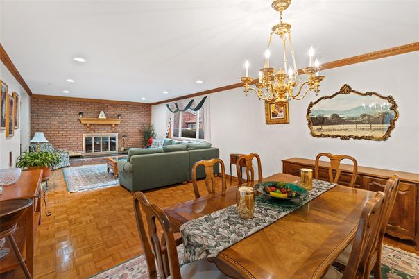 Chandelier, Dining room, Fireplace, Interior, Living room, Recessed Lighting, Stone Walls, Wood Texture Flooring