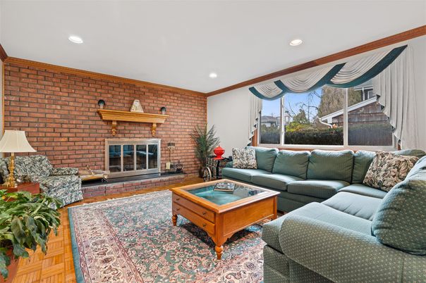 Fireplace, Interior, Living room, Recessed Lighting, Stone Walls, Wood Texture Flooring