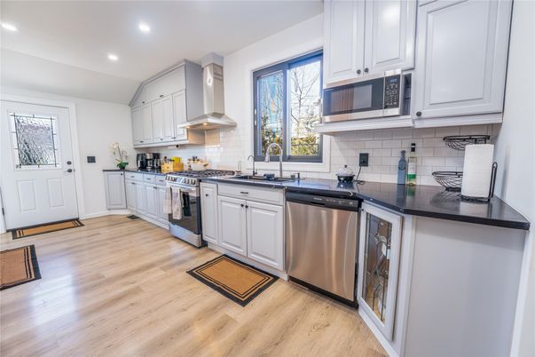 Interior, Kitchen, Recessed Lighting, Stainless Steel Appliances, Wood Texture Flooring
