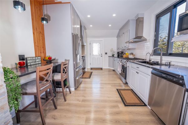 Interior, Kitchen, Recessed Lighting, Stainless Steel Appliances, Wood Texture Flooring