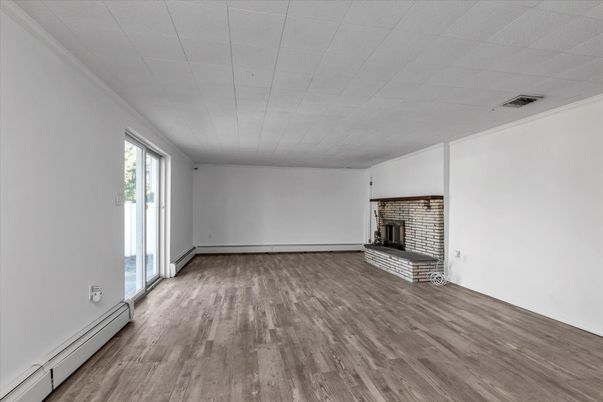 Empty room, Fireplace, Interior, Stone Walls, Wood Texture Flooring