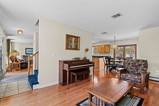 Dining room, Interior, Pendant Lights, Piano, Wood Texture Flooring