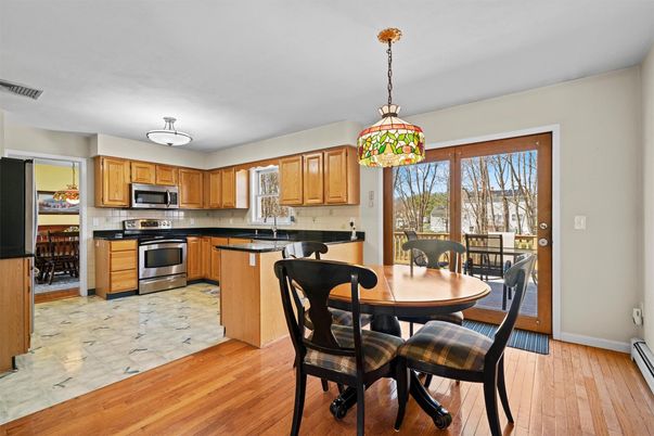 Dining room, Interior, Kitchen, Pendant Lights, Stainless Steel Appliances, Wood Texture Flooring