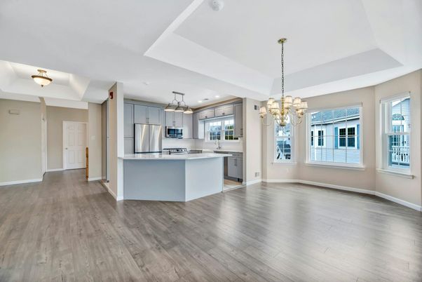 Chandelier, Interior, Kitchen, Pendant Lights, Recessed Lighting, Stainless Steel Appliances, Wood Texture Flooring