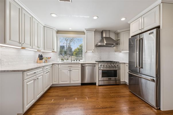 Interior, Kitchen, Recessed Lighting, Stainless Steel Appliances, Wood Texture Flooring