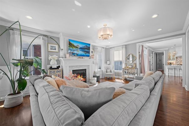 Chandelier, Fireplace, Interior, Living room, Recessed Lighting, Wood Texture Flooring