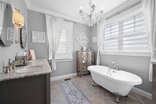 Bathroom, Chandelier, Dual Sink Vanities, Free Standing Baths, Interior, Marble, Wood Texture Flooring