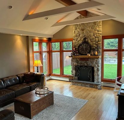 Fireplace, Interior, Living room, Recessed Lighting, Stone Walls, Wood Texture Flooring