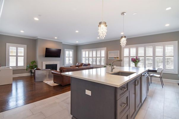 Chandelier, Dining room, Fireplace, Interior, Kitchen, Living room, Pendant Lights, Recessed Lighting, Wood Texture Flooring