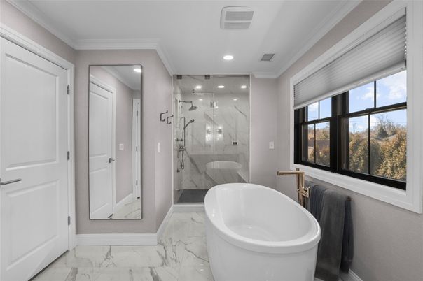 Bathroom, Free Standing Baths, Glass Shower, Interior, Marble, Marble Walls, Recessed Lighting