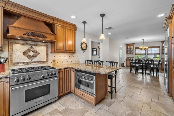Chandelier, Dining room, Interior, Kitchen, Pendant Lights, Recessed Lighting, Stainless Steel Appliances