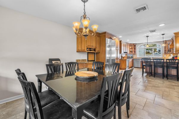 Chandelier, Dining room, Interior, Kitchen, Pendant Lights, Recessed Lighting, Stainless Steel Appliances