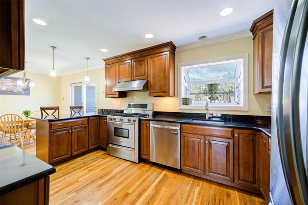 Dining room, Interior, Kitchen, Pendant Lights, Recessed Lighting, Stainless Steel Appliances, Wood Texture Flooring