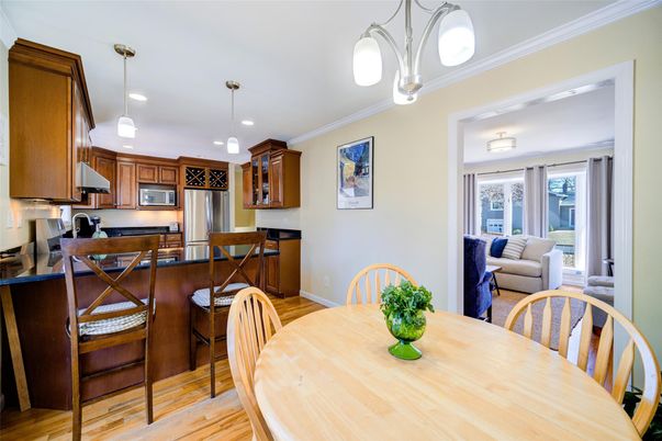 Dining room, Interior, Kitchen, Pendant Lights, Recessed Lighting, Stainless Steel Appliances, Wood Texture Flooring