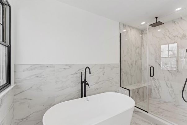 Bathroom, Free Standing Baths, Glass Shower, Interior, Marble, Marble Walls, Recessed Lighting