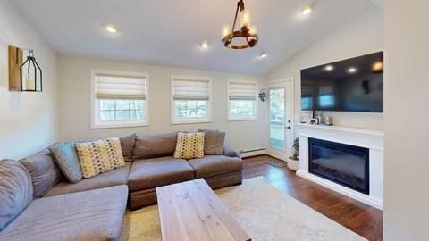 Chandelier, Fireplace, Interior, Living room, Pendant Lights, Recessed Lighting, Wood Texture Flooring