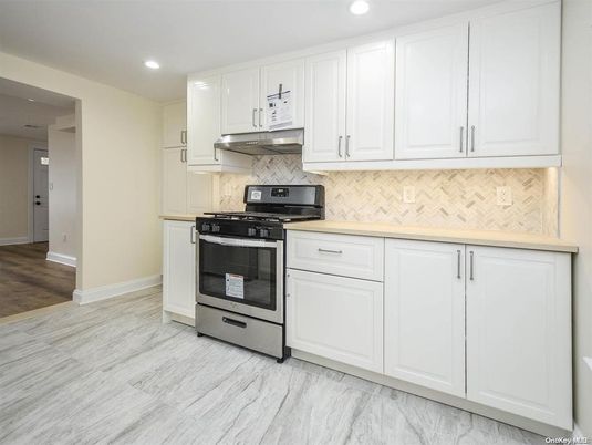 Interior, Kitchen, Marble, Marble Walls, Recessed Lighting, Wood Texture Flooring