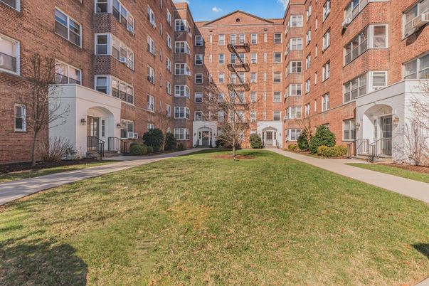 Backyard, Exterior, Facade, Brick Facade, Condo Building