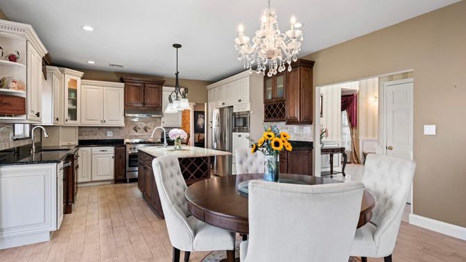 Chandelier, Dining room, Interior, Kitchen, Pendant Lights, Recessed Lighting, Stainless Steel Appliances, Wood Texture Flooring