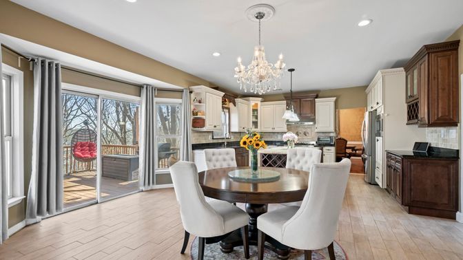 Chandelier, Dining room, Interior, Kitchen, Pendant Lights, Recessed Lighting, Stainless Steel Appliances, Wood Texture Flooring