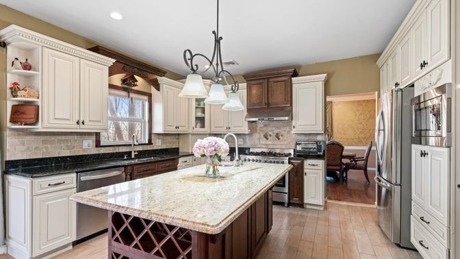 Dining room, Interior, Kitchen, Pendant Lights, Recessed Lighting, Stainless Steel Appliances, Wood Texture Flooring