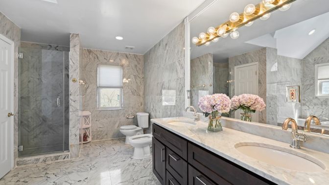 Bathroom, Dual Sink Vanities, Glass Shower, Interior, Marble, Marble Walls, Recessed Lighting
