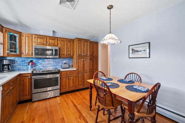 Dining room, Interior, Kitchen, Pendant Lights, Stainless Steel Appliances, Wood Texture Flooring