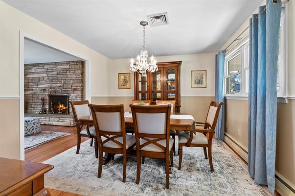 Chandelier, Dining room, Fireplace, Interior, Stone Walls, Wood Texture Flooring