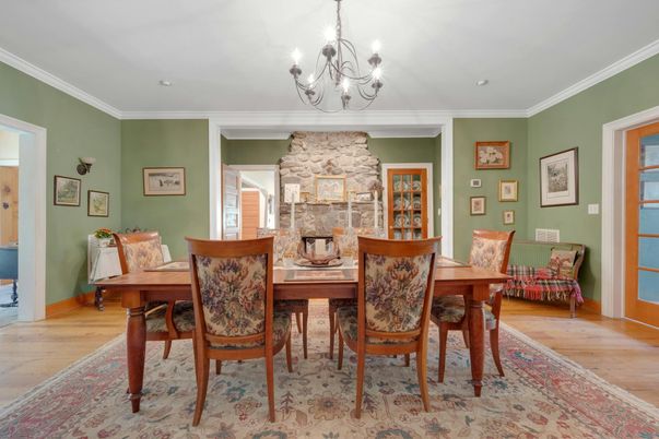 Chandelier, Dining room, Fireplace, Interior, Stone Walls, Wood Texture Flooring