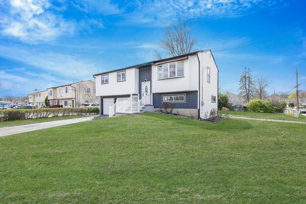 Attached, Backyard, Exterior, Facade, Raised Ranch