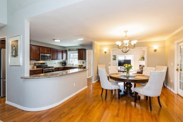 Chandelier, Dining room, Interior, Kitchen, Stainless Steel Appliances, Wood Texture Flooring