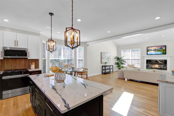 Dining room, Fireplace, Interior, Kitchen, Living room, Pendant Lights, Recessed Lighting, Stainless Steel Appliances, Wood Texture Flooring