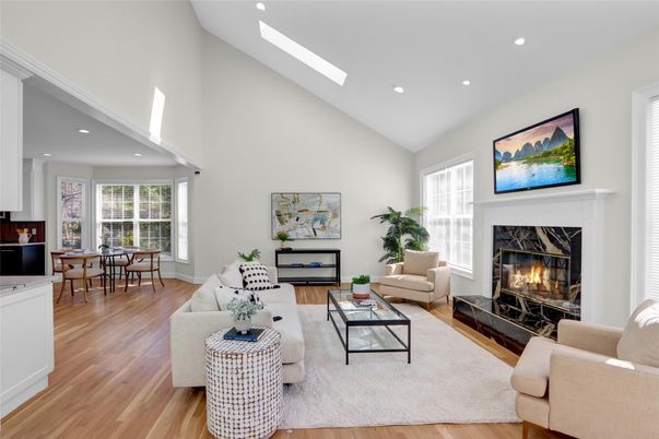 Dining room, Fireplace, Interior, Living room, Recessed Lighting, Wood Texture Flooring