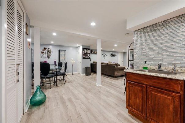 Dining room, Interior, Living room, Recessed Lighting, Stone Walls, Wood Texture Flooring