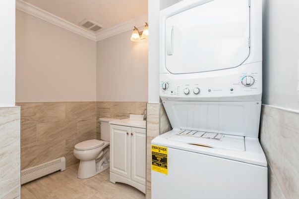Bathroom, Interior, Utility Closets, Washer, Wood Texture Flooring