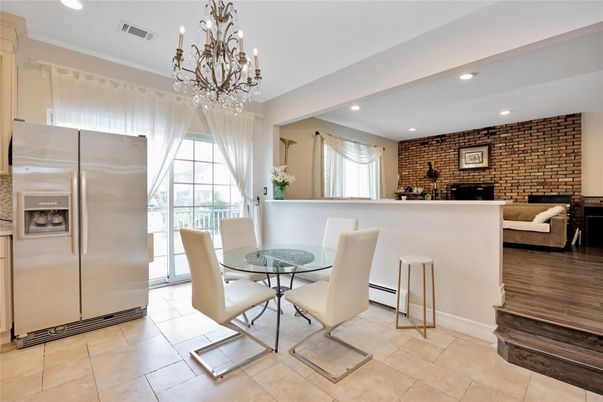 Chandelier, Dining room, Interior, Kitchen, Recessed Lighting, Stainless Steel Appliances, Stone Walls