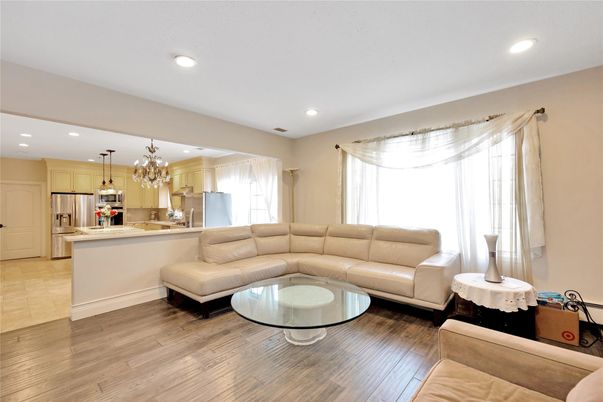 Chandelier, Interior, Kitchen, Living room, Recessed Lighting, Stainless Steel Appliances, Wood Texture Flooring