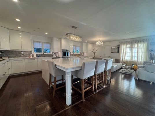 Chandelier, Interior, Kitchen, Living room, Recessed Lighting, Stainless Steel Appliances, Wood Texture Flooring