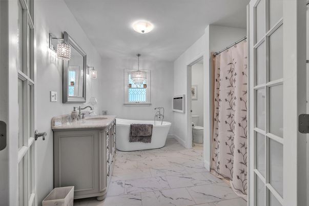 Bathroom, Dual Sink Vanities, Free Standing Baths, Interior, Marble, Pendant Lights
