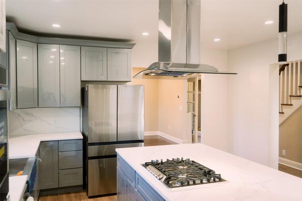 Interior, Kitchen, Marble Walls, Recessed Lighting, Stainless Steel Appliances, Wood Texture Flooring
