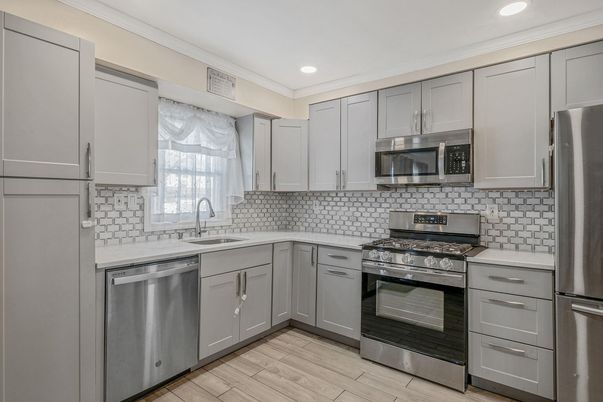 Interior, Kitchen, Recessed Lighting, Stainless Steel Appliances, Wood Texture Flooring