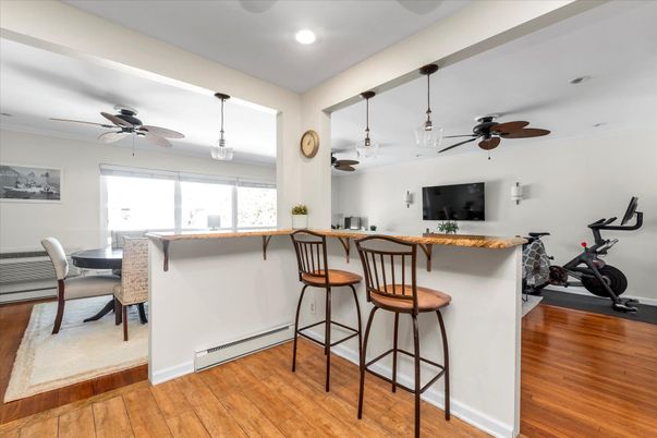 Dining room, Fitness Equipment, Interior, Pendant Lights, Recessed Lighting, Wood Texture Flooring