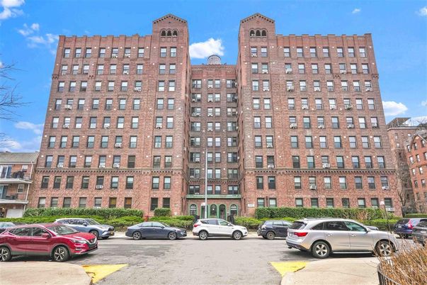 Exterior, Facade, Brick Facade, Condo Building