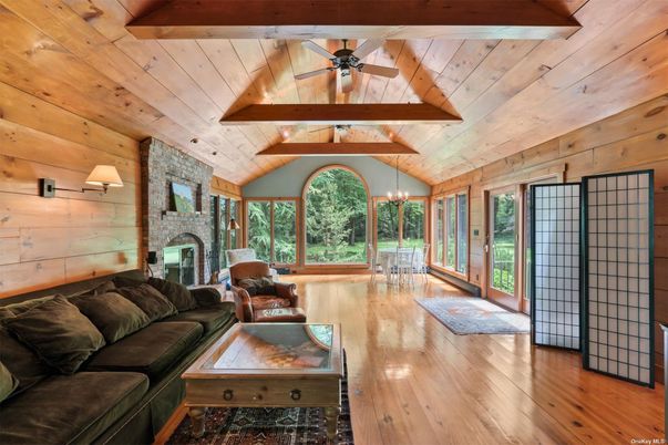 Chandelier, Dining room, Fireplace, Interior, Living room, Stone Walls, Wooden Beams, Wooden Ceilings, Wood Texture Flooring, Wooden Walls
