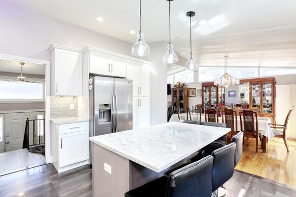 Chandelier, Dining room, Interior, Kitchen, Pendant Lights, Recessed Lighting, Stainless Steel Appliances, Wood Texture Flooring