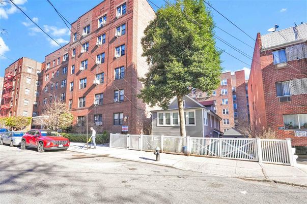 Exterior, Facade, Brick Facade, Condo Building